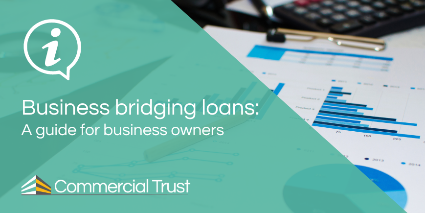 Business bridging loan banner in front of paperwork on a desk looking at company performance figures