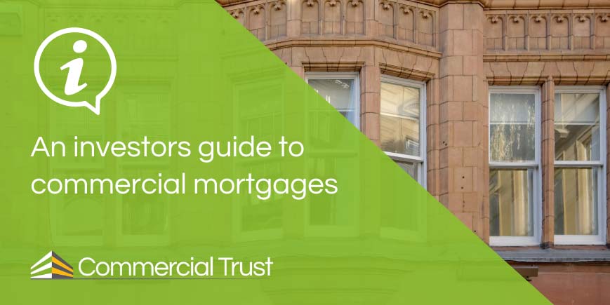 An investors guide to commercial mortgages banner in front of traditional red-stone office building