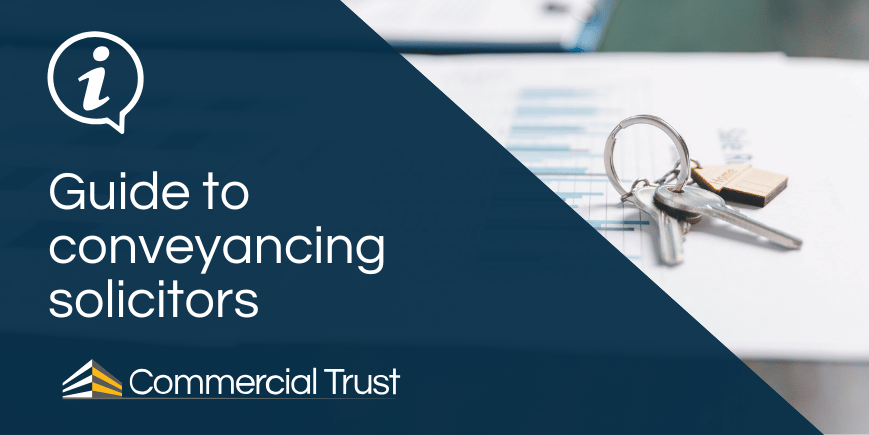 Navy blue banner with text "Guide to conveyancing solicitors" behind which is paperwork with a set of keys on it