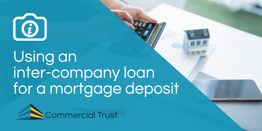 Blue banner with text "Using an inter-company loan for a mortgage deposit" with someone working at a desk behind