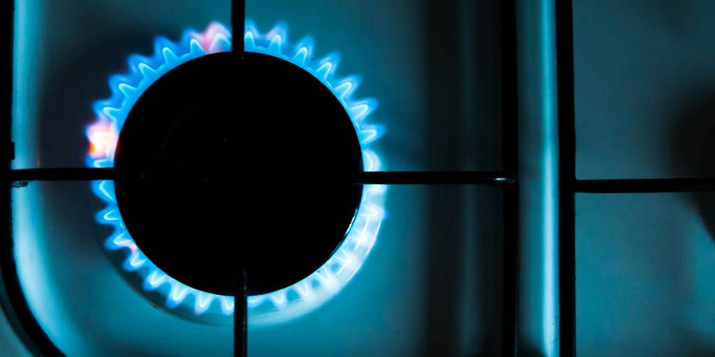 Close up of single lit gas hob ring