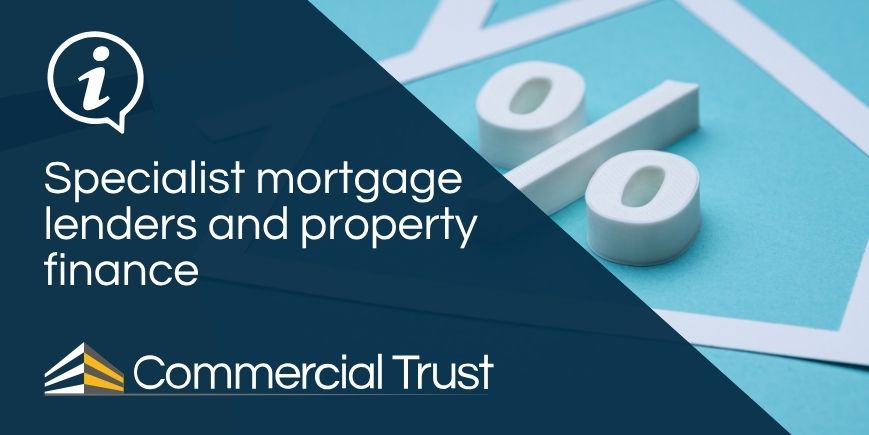 Specialist mortgage lenders and property finance on navy blue banner with outline drawing of house and percent symbol in the background