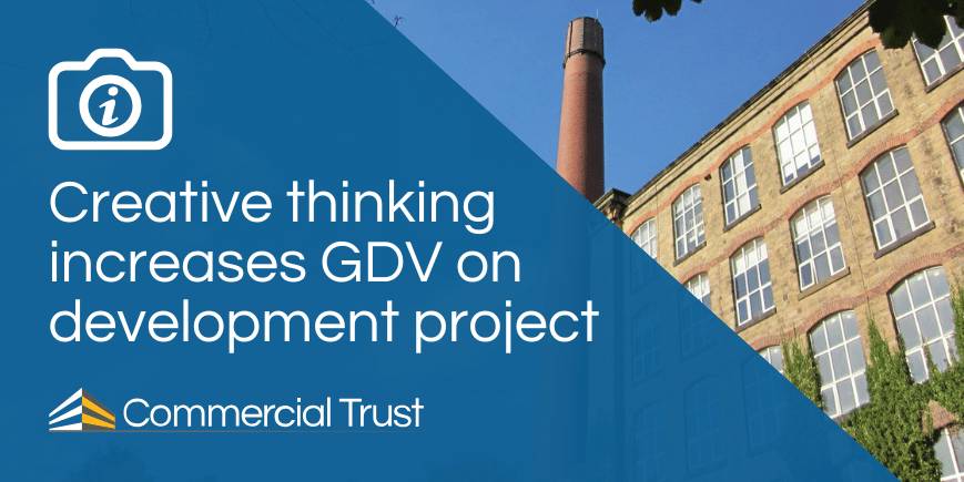Blue banner with text "Creative thinking increases GDV on development project" in front of photo of traditional industrial mill building